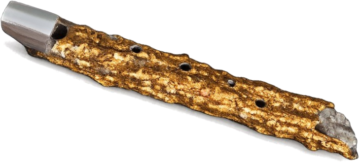 horizontal photograph of the fulgurite flute, its golden, rough glass body offset by a polished metal mouthpiece